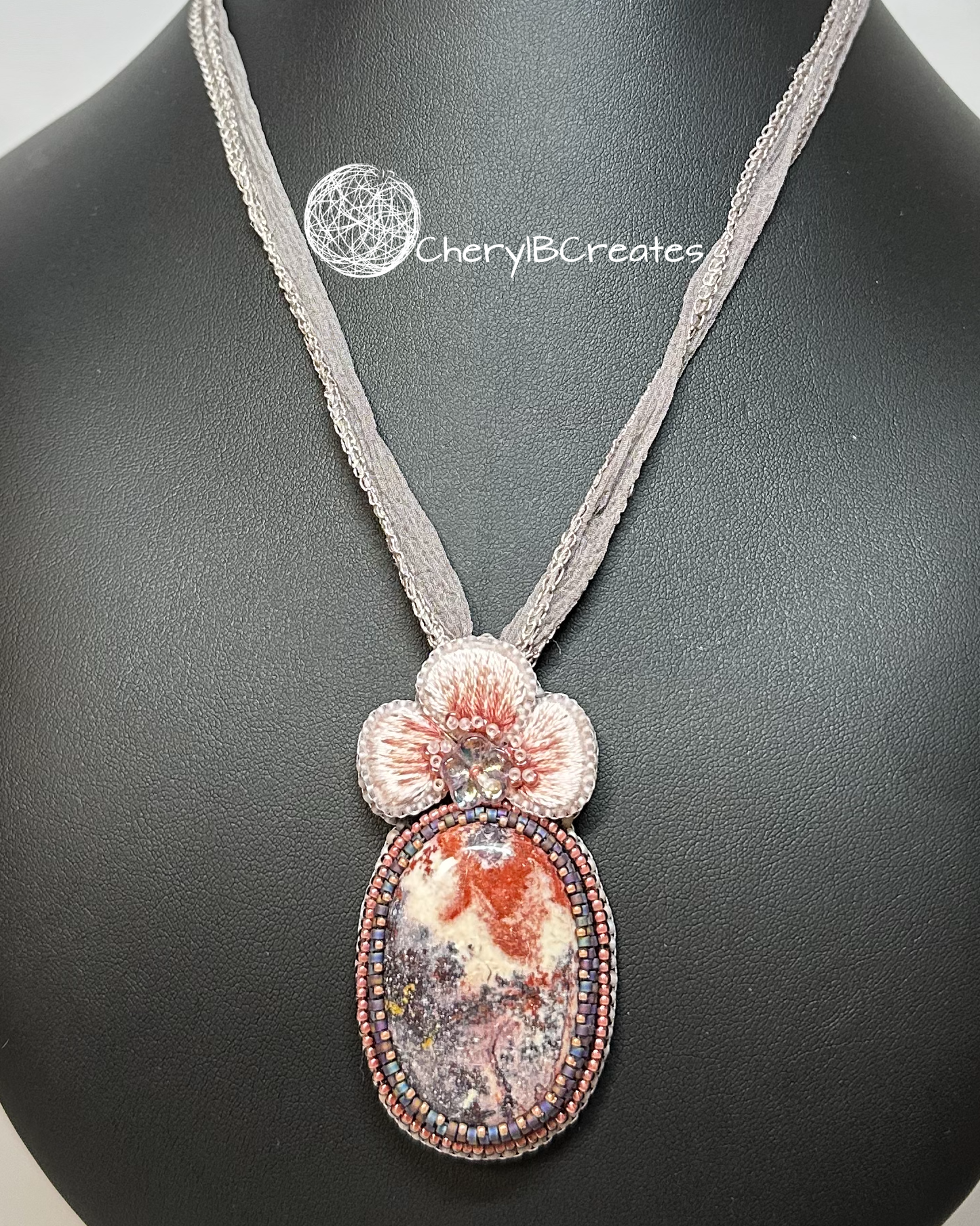 Rhodonite With Hand Embroidered Flower